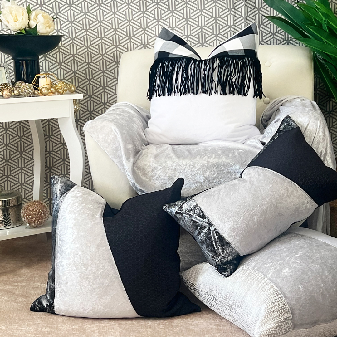 Plush white pillow with fringe