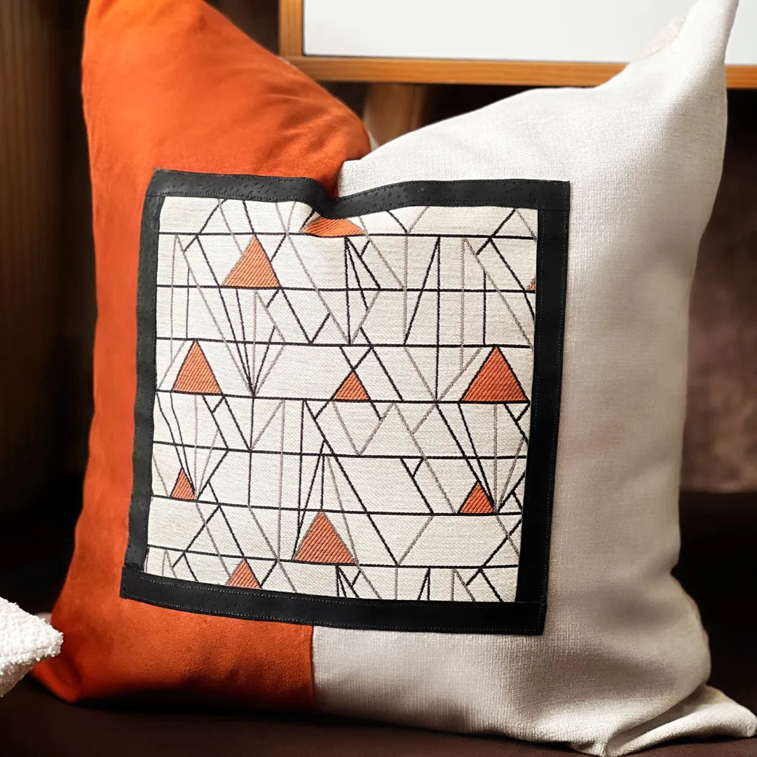 orange and beige art deco pillow