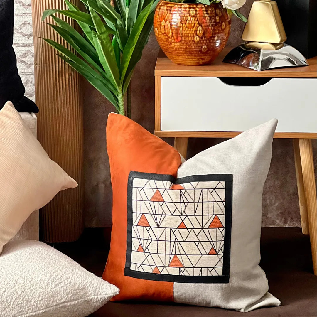 orange and beige art deco pillow