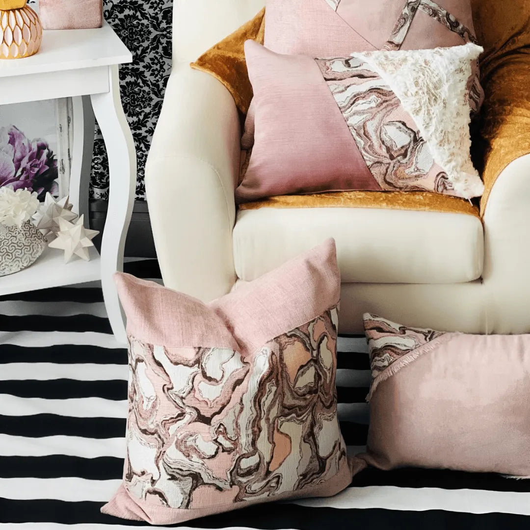 Pink suede pillow by EmbellyshHome