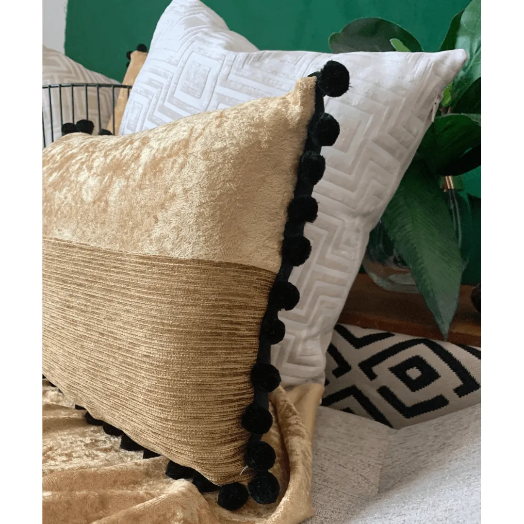 black and gold pillow by EmbellyshHome