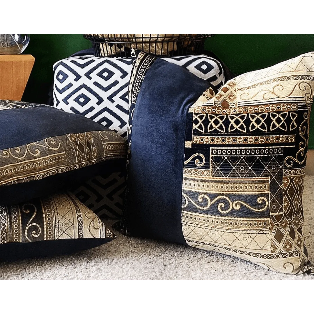 black and gold pillow by EmbellyshHome