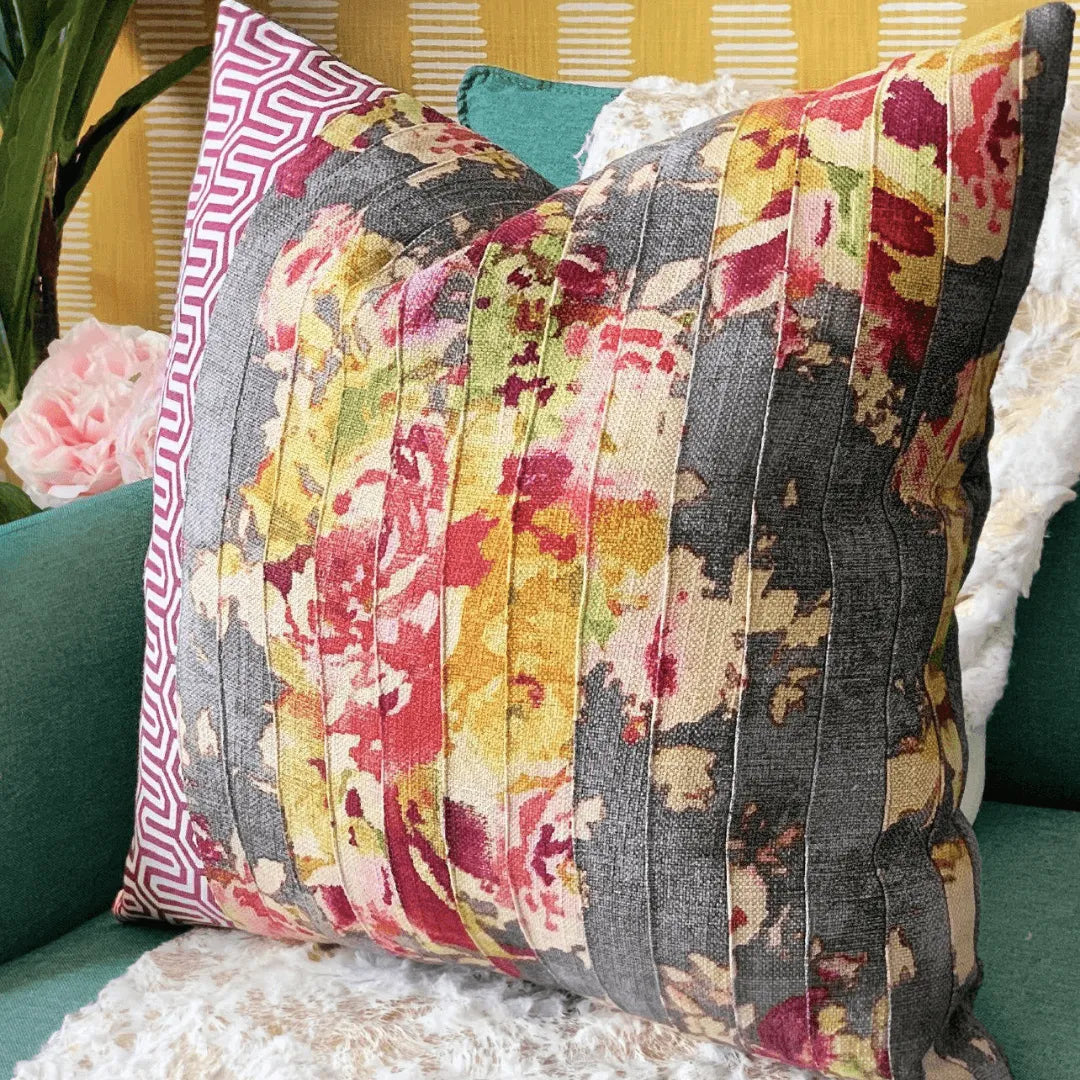 pink and gray floral decorative pillow