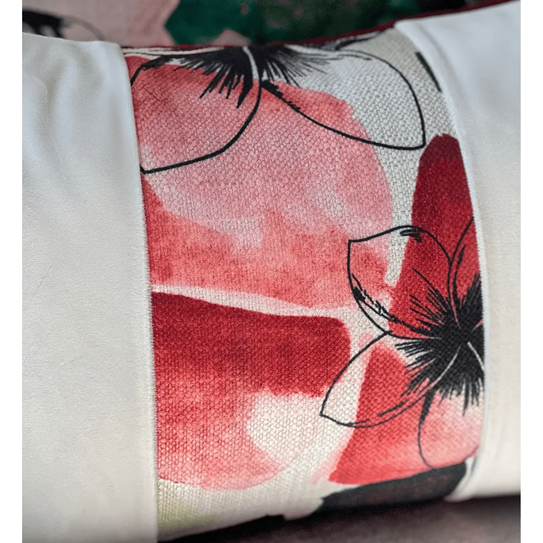 red floral throw pillow