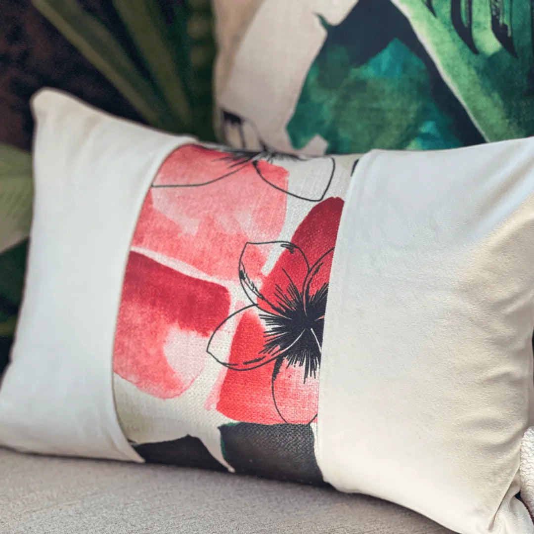 red floral throw pillow