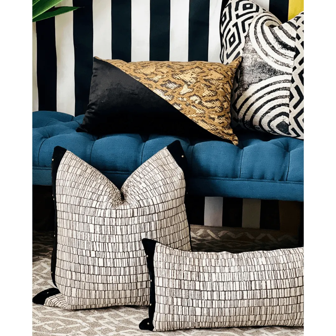 black and white pillow with studs