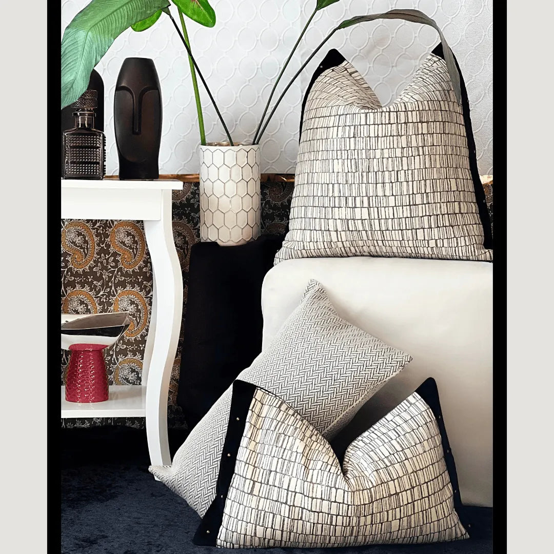 black and white pillow with studs