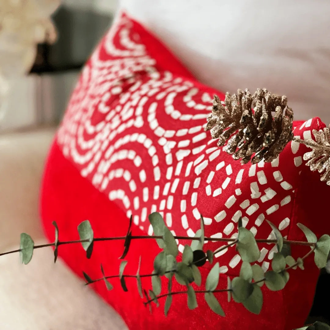 red and white Christmas pillow