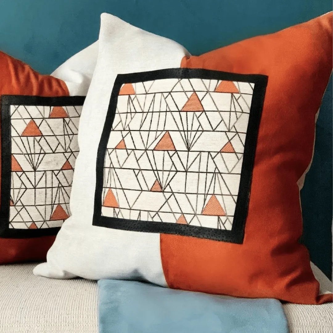 orange and beige art deco pillow