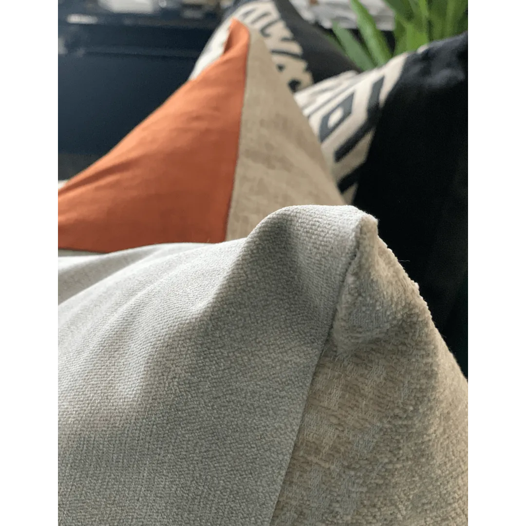 orange and beige art deco pillow