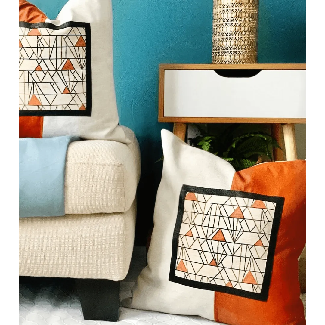 orange and beige art deco pillow