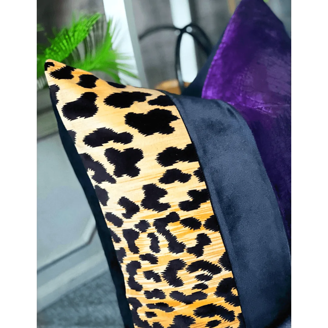 Purple and black animal print pillow
