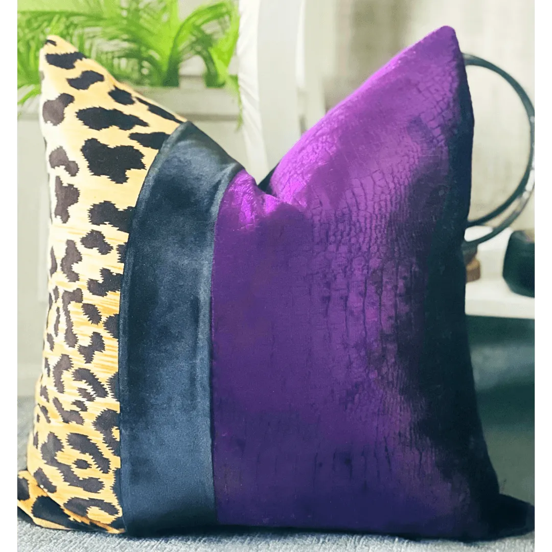 Purple and black animal print pillow