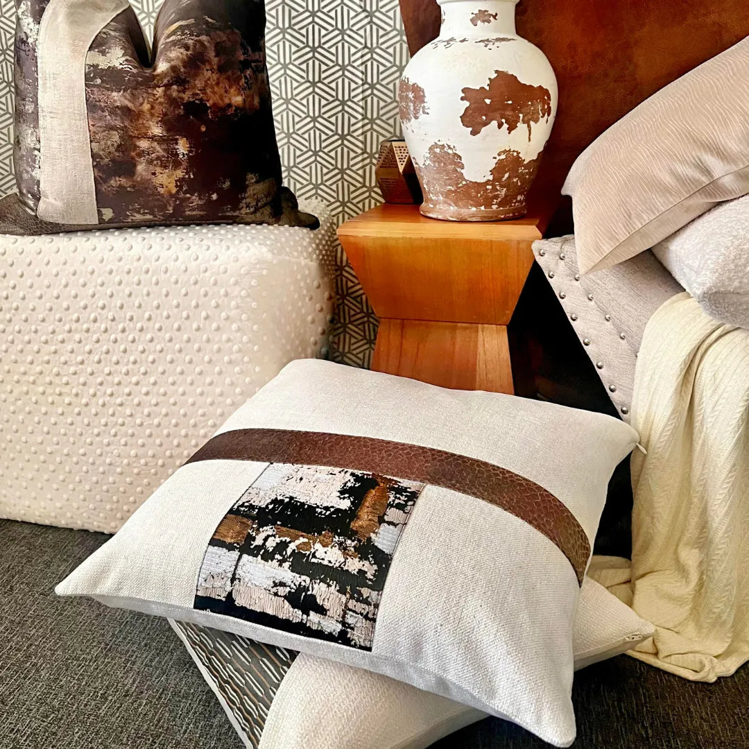 beige and brown metallic pillow
