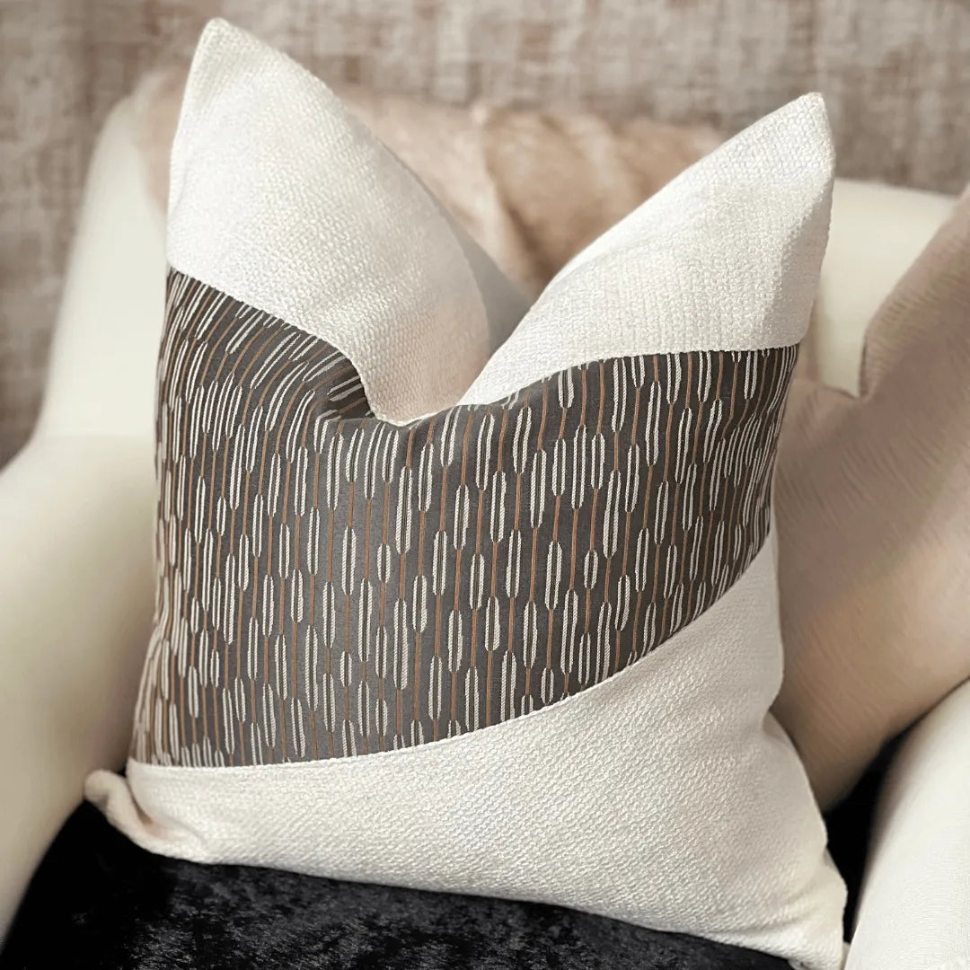 Beige and brown decorative pillow by EmbellyshHome
