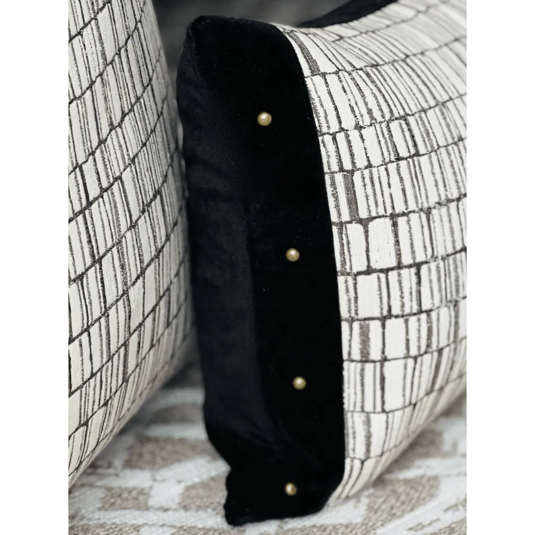black and white pillow with studs