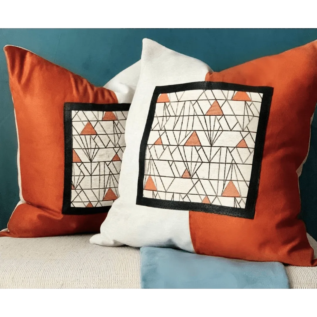 orange and beige art deco pillow