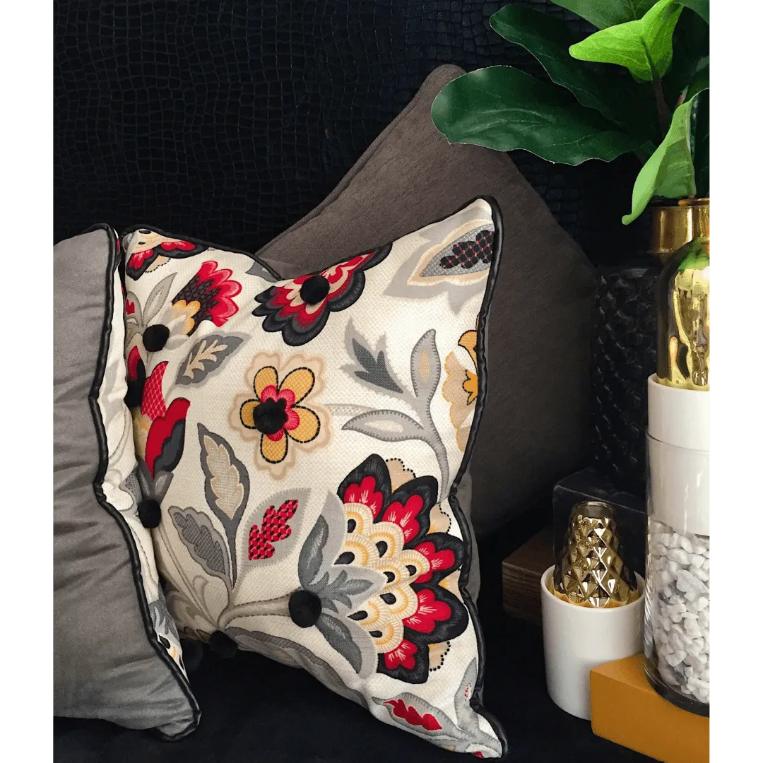 black and red floral pillow