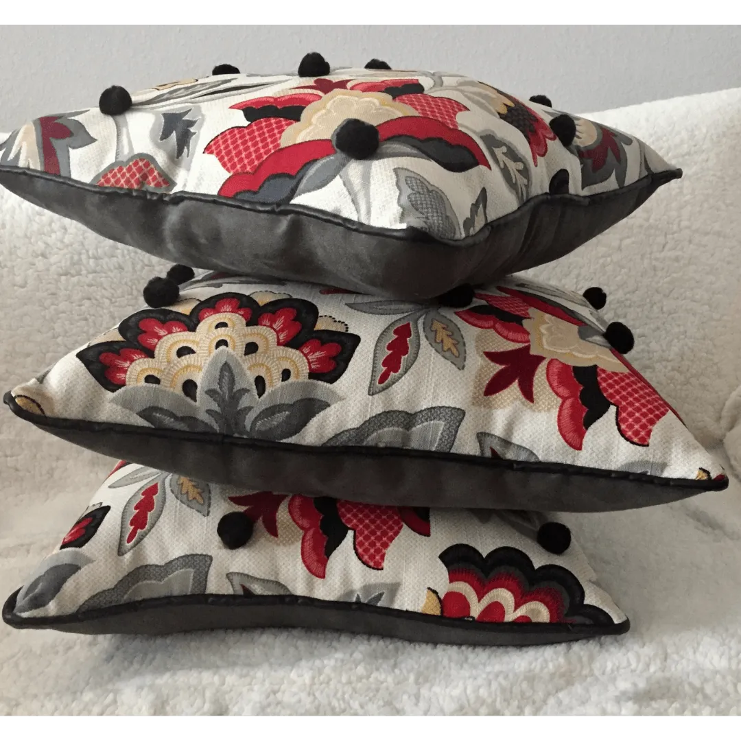 black and red floral pillow