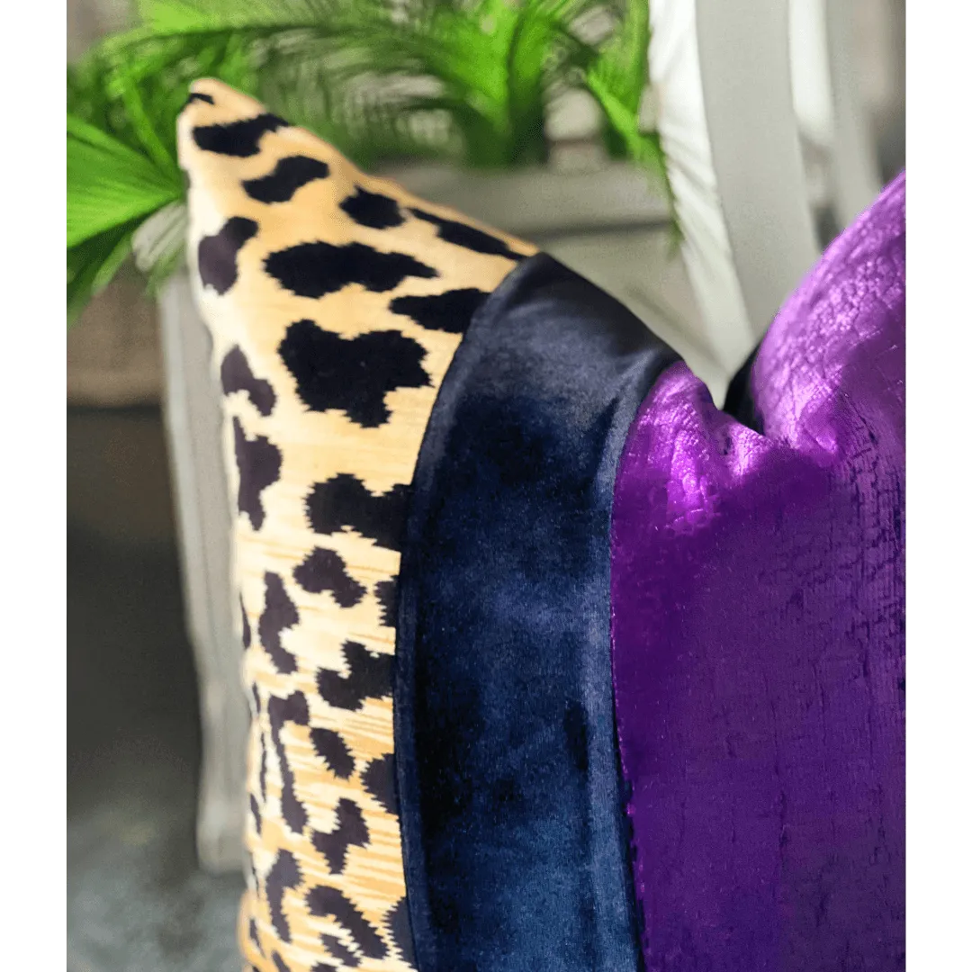 Purple and black animal print pillow