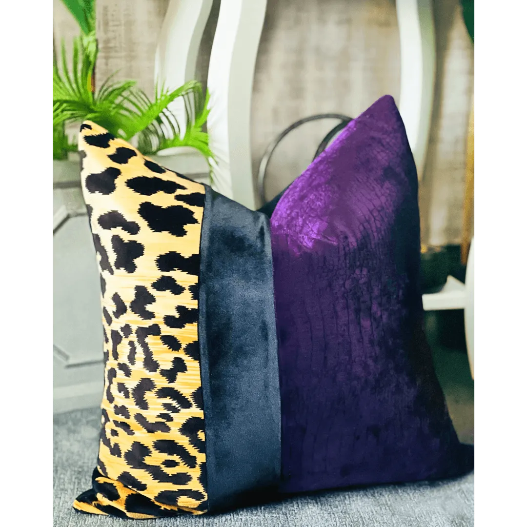 Purple and black animal print pillow